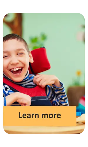 A boy in a wheelchair smiling. Text says "Learn more"